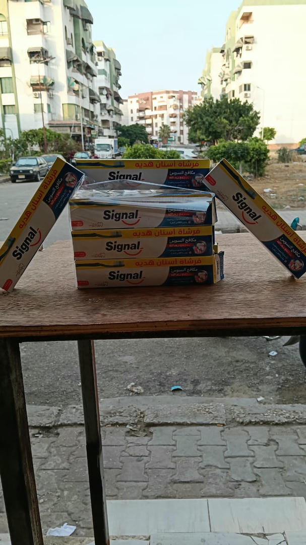 سيجنل وسط عرض +فرشة اسنان 